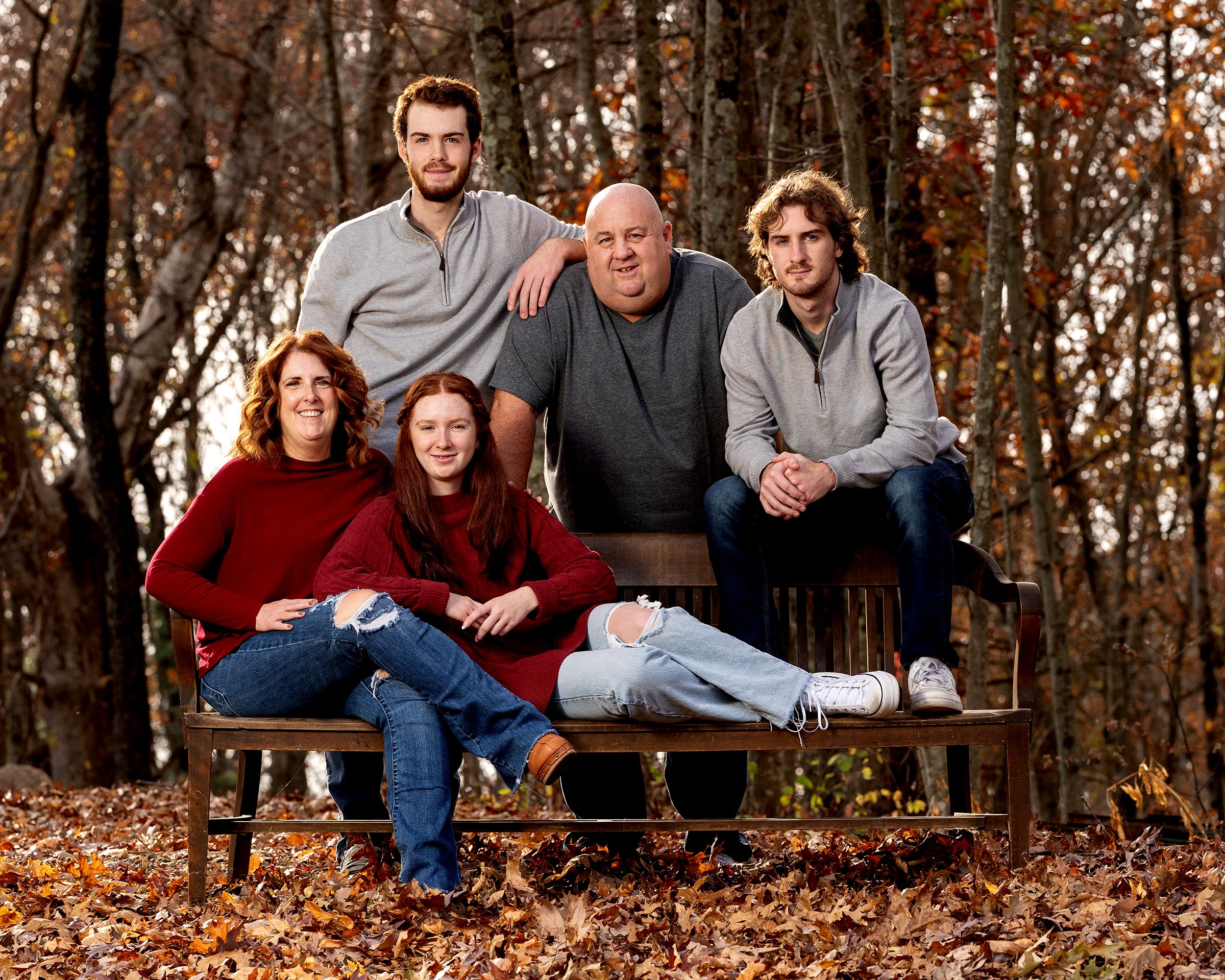 A family enjoying a fall portrait session